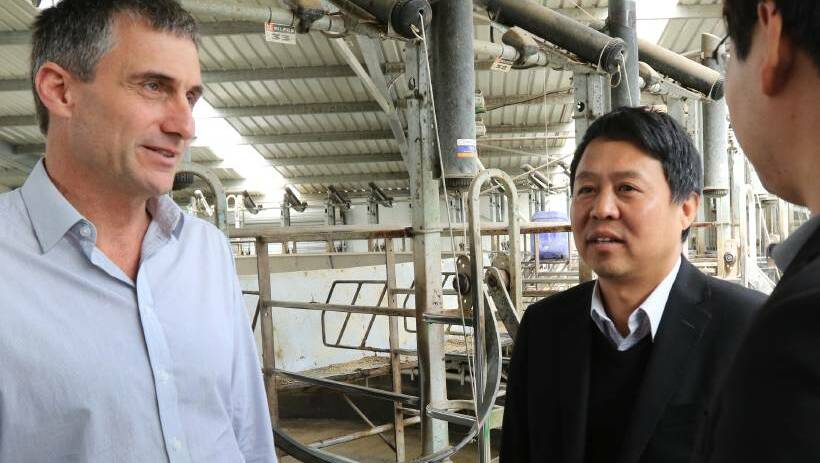 VDL owner Lu Xianfeng and director David Beca at Woolnorth in January when Mr Lu visited the site prior to the sale being finalised. The company has unveiled plans to make fresh milk for the Chinese market.