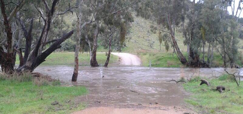 The creek at Murringo Gap broke its banks and prevented drivers from using the roads after storms hit the region last week. Photo by Louise Heckenberg. 