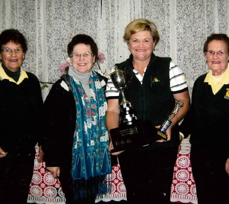 The Dwyer sisters, Marie Martin (left), Patty Boulding and Bev Good (right) with Canemumbola Cup winner Wendy Tuckerman. It proved to be a perfect day for the annual event. 