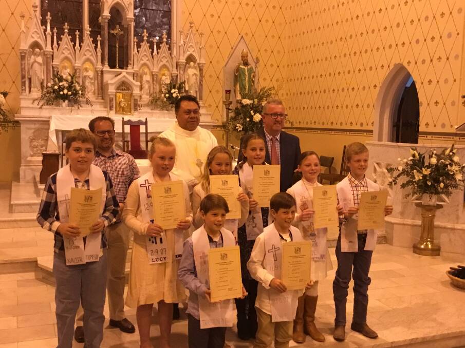 Eight children celebrated their First Holy Communion at St Patrick's Church Boorowa. 