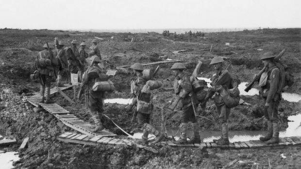 Troops of the 5th Division during the Battle of Passchendaele. Photo: Australian War Memorial/SMH 