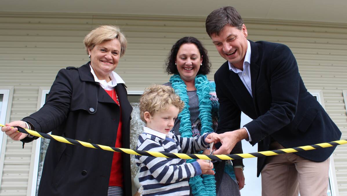 From left - Wendy Tuckerman, Administrator Hilltops Council, Sarah Rose, Centre Manager and her son Thomas (4) and Angus Taylor MP. 
 