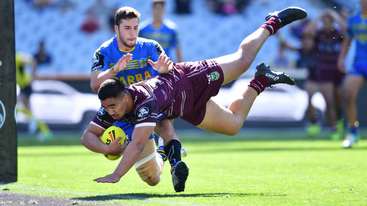 Super-sub: Keith Titmuss scores the match-winning try on Sunday.  Photo: NRL Imagery