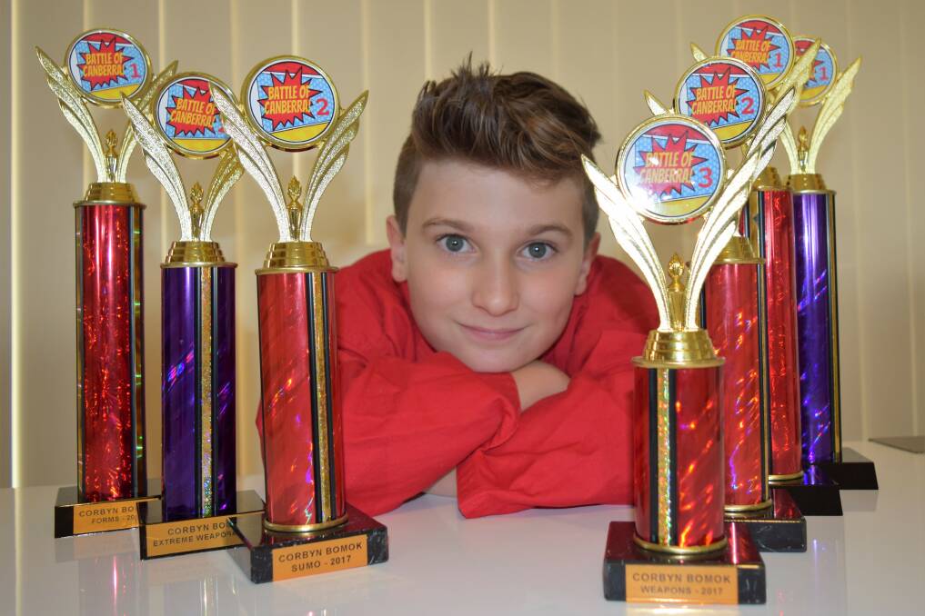  Corbyn Bomok with his trophies. He has booked his spot at the Australian Titles Tournament which will be held in Sydney at the end of the year.
