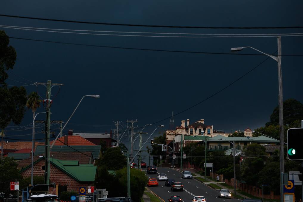 The storm moves in over Bulli. Picture: Adam McLean