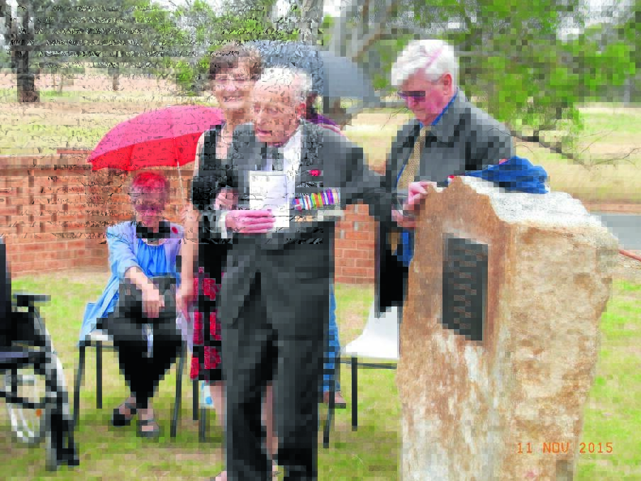 Max Holmes unveiling the Frogmore Commemorative plaque together with his daughter Pauline and Bede Ryan, seated Jan Ryan.