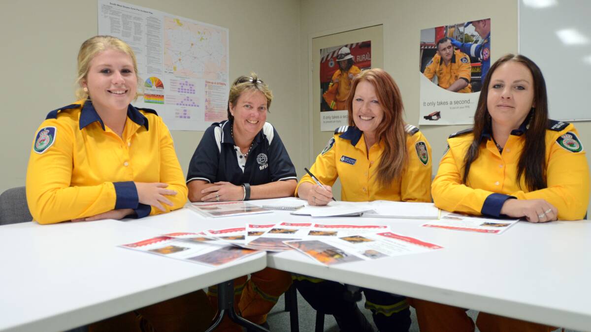 Members of the Rural Fire Service South West Slopes Zone women's working group Lizzie Butt from the Monteagle brigade, Ruth McDevitt of Cootamundra brigade, South West Slopes Zone District Support Brigade captain Louise Livermore and Nikki Pethers of the support brigade busily preparing the recruitment and demonstration day set down for April 30.