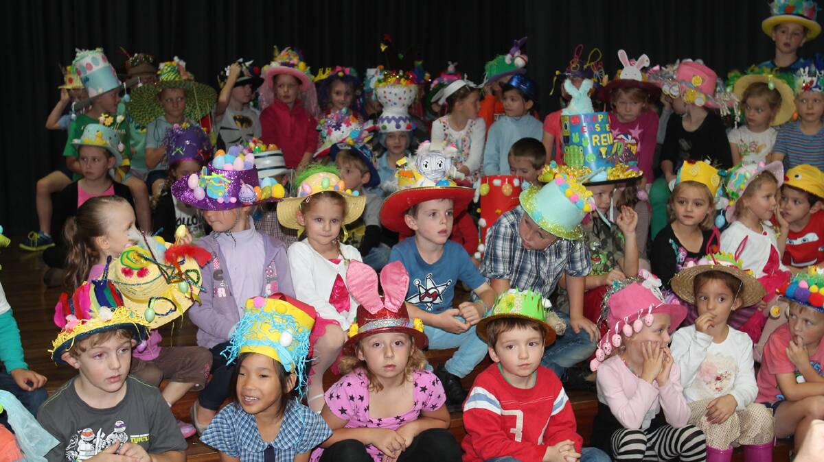 COOTAMUNDRA: Pictured performing some songs during their recent Easter Hat Parade were the students of Cootamundra Public School. Photo: Cootamundra Herald