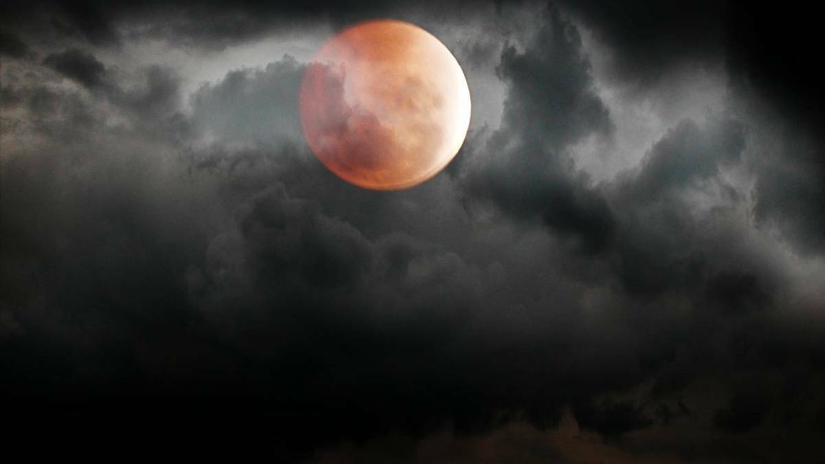 GOULBURN: Stuart Baker caught the red moon just as it was coming out from beneath a cloud on Tuesday night in Goulburn.