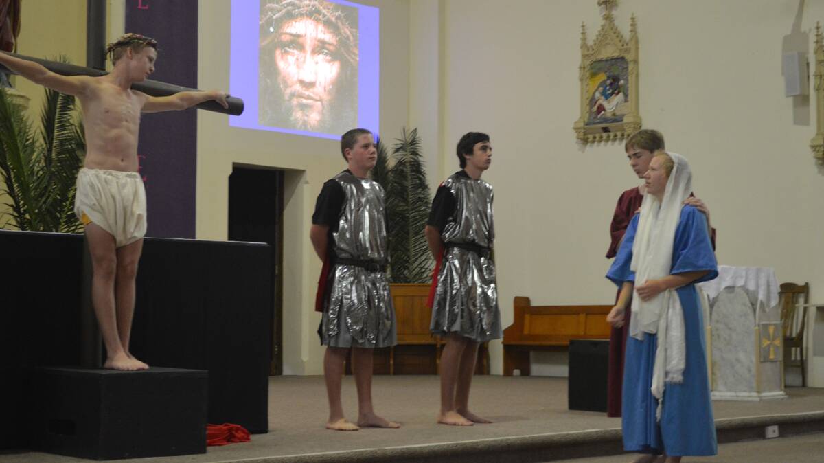 COOTAMUNDRA:  Pictured are Sacred Heart Central School students performing the Passion Play last week. The Passion Play is a prayer that recounts the Passion of our Lord. It was performed on Friday, April 11 to all of the students, parents and friends as well as 120 invited guests from Catholic schools in the Western Region. It will be performed again on Good Friday at 3pm. All are invited to attend. Photo: Contributed