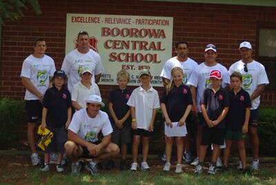 Part of the Community Carnival at Boorowa Central School were (from back left) Brett Harris, Scott Logan, Ricky Thorby, Kevin Kingston, Josh Cordoba. In the front (from left) Tristan Mears, Ryan Houston, Terry Campese, Alex Noakes, Jack Fahey, Taylah Cutting, Brad Wales, and Jesse Halls.