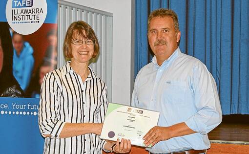 Louise Pinson presents Stephen Bunnell  with both a Cert III & Cert IV.