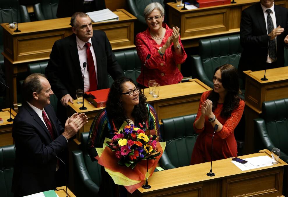 Labour MP Louisa Wall is applauded by fellow Labour MPs from left, David Shearer, Trevor Mallard, Maryan Street and Jacinda Ardern after the third reading and vote on the Marriage Equality Bill. Photo: Getty Images