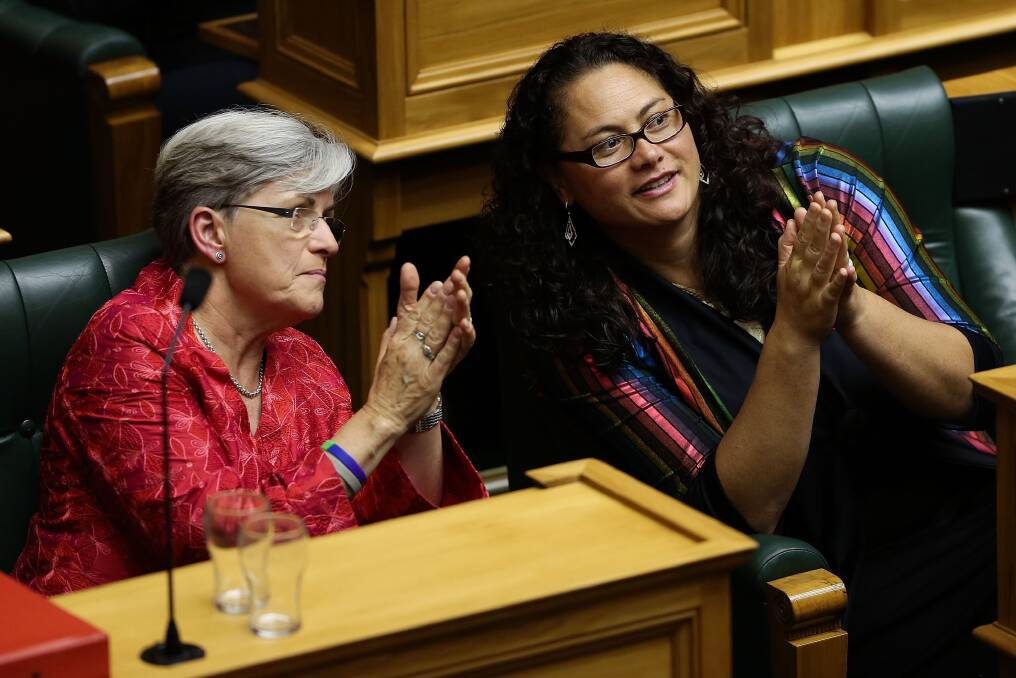 Labour MPs Louisa Wall and Maryan Street applaud after the third reading and vote on the Marriage Equality Bill at Parliament House on April 17, 2013 in Wellington, New Zealand. Photo: Getty Images