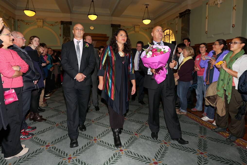 reen MP Kevin Hague, Labour MP Louisa Wall and National MP Tau Henare are greeted by supporters after the third reading and vote on the Marriage Equality Bill. Photo: Getty Images