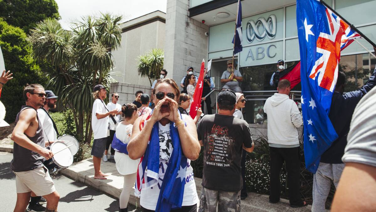Anti-vax protesters mob the ABC building on Northbourne Avenue. Picture: Dion Georgopoulos