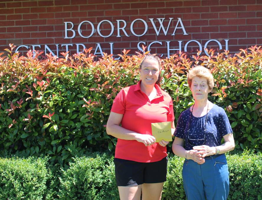 Year Advisor, Claire Johnson, presented Young-Boorowa Can Assist Branch representative, Mrs Kay Doemling, with funds raised by Boorowa Central School Year 12 students.