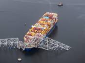 In an aerial view, cargo ship Dali is seen after running into and collapsing the Francis Scott Key Bridge on March 26, 2024 in Baltimore, Maryland. Picture Getty Images