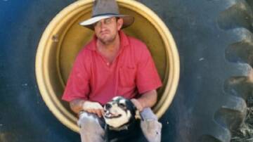 Malcolm McAlister with one of the missing dogs Tiger.