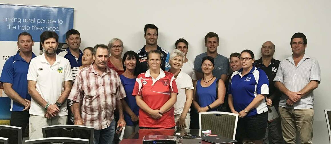 David Shillington (back) with Grafton mental health professionals and members of the South Grafton Rebels and the Grafton Ghosts.