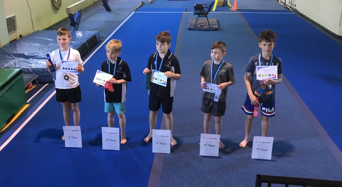 Boorowa's Preston Harris (left), had an excellent weekend at the Yass Gymnastic Competition, placing first in all of his apparatuses en route to claiming overall honours. Photo supplied by Erin Harris. 