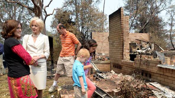 Children can feel a profound sense of loss after a natural disaster. Pictured: children who lost their home to fire in the Blue Mountains, west of Sydney, in 2013. Photo: Dan Himbrechts