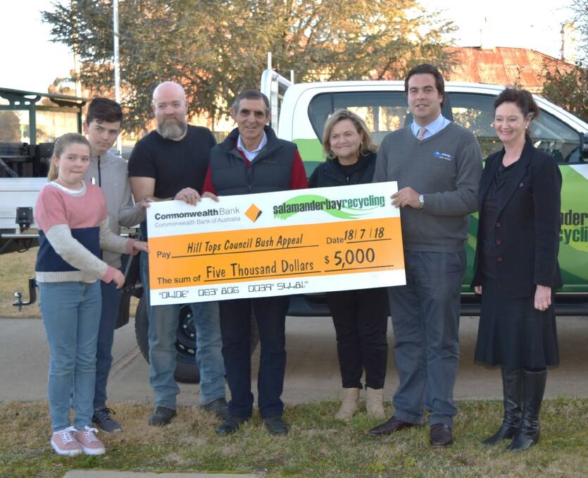 Gerard McClafferty (third from left) presents the cheque to David Marsh, Hilltops Councillor Wendy Tuckerman, Richard Fleming and Janene Hurley. 