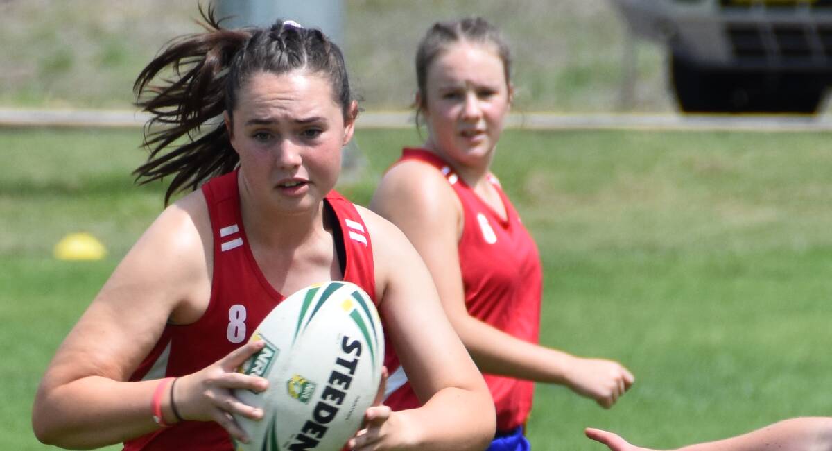 Abby Grant (pictured playing League Tag) and Clare Flick will represent Boorowa in the under 16 Woodbridge women's tackle rugby league side this season.