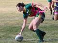 Lucy Woods crossing for a try for the Roverettes. Photo by Sharon Hinds.