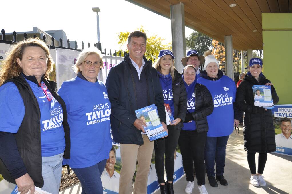 CAMPAIGNING: Angus Taylor was returned as Hume MP with a narrowed margin at Saturday's election. He's pictured here with Goulburn MP Wendy Tuckerman and supporters.