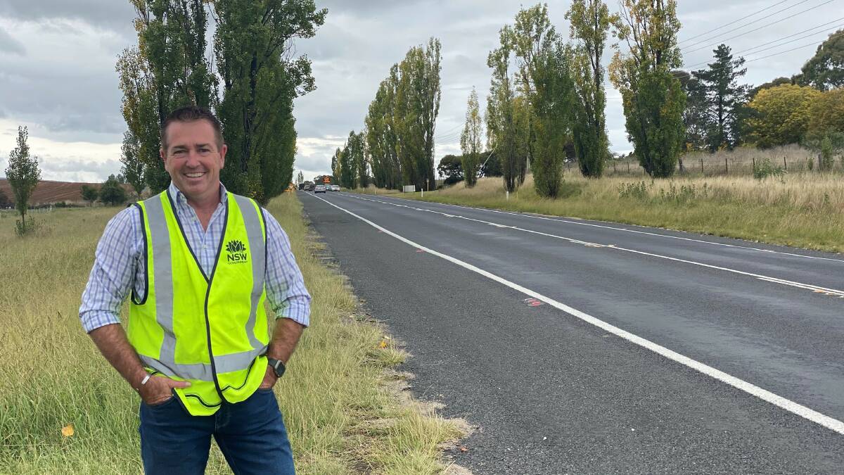 NSW Minister for Transport Paul Toole alongside the Great Western Highway near Bathurst.