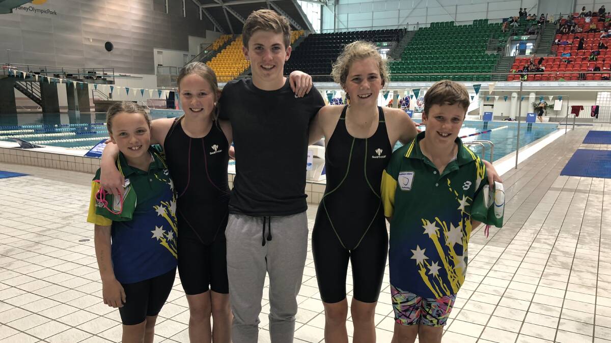 Tamsyn Ritchie, Isabella Piper, Jacob Piper, Stephanie Piper and Noah Coble at Sydney Olympic Park.