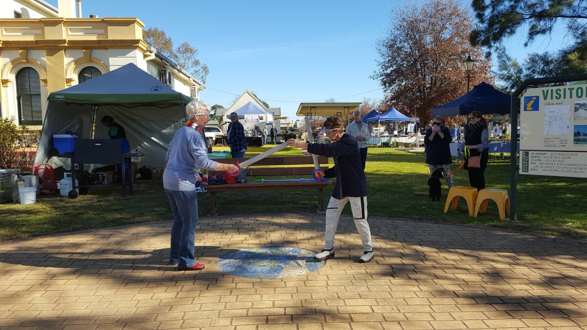 Another successful Market Day last Saturday - you'd think they were even fighting over the bargains. Photo by Jayne Apps. 
