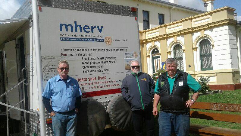 Rob Woolley with Boorowa Rotary past President Steven Meere and Rotarian Mike Ward outside the MHERV Van.

