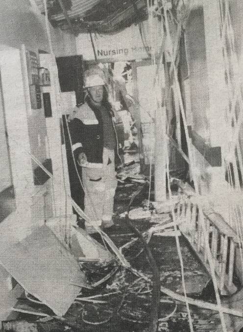 Captain Leon Barton pictured inside the destroyed hospital at the time. 