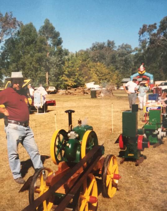 A younger Jack Carmody (left) with the machines he loved. Photo supplied. 