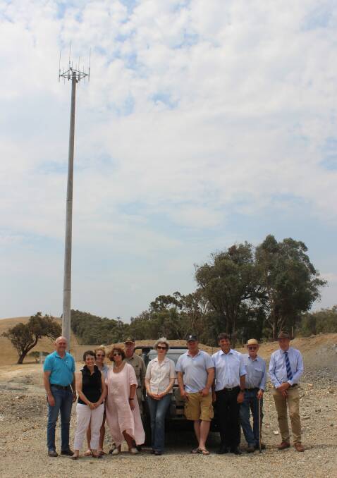 Angus Taylor (3rd from right) with Telstra general manager ACT, Southern NSW Chris Taylor (far left) and Member for Goulburn Pru Goward (2nd from left) with members of Upper Lachlan Shire Council (including councillors Pam Kensit and Paul Culhane) and the Laggan community at the new Peelwood Road Telstra Mobile Black Spot tower site.


