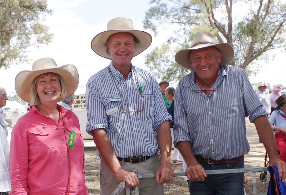 Narelle Nixon, George Merriman and Bruce Nixon. The Nixon's took out first place in the Flock Ewe Competition.