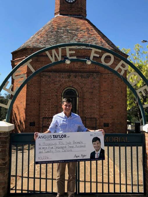 Angus Taylor at Boorowa War Memorial where Armistice Centenary funding from the Federal Government will purchase new plaques to honour Boorowa district veterans.