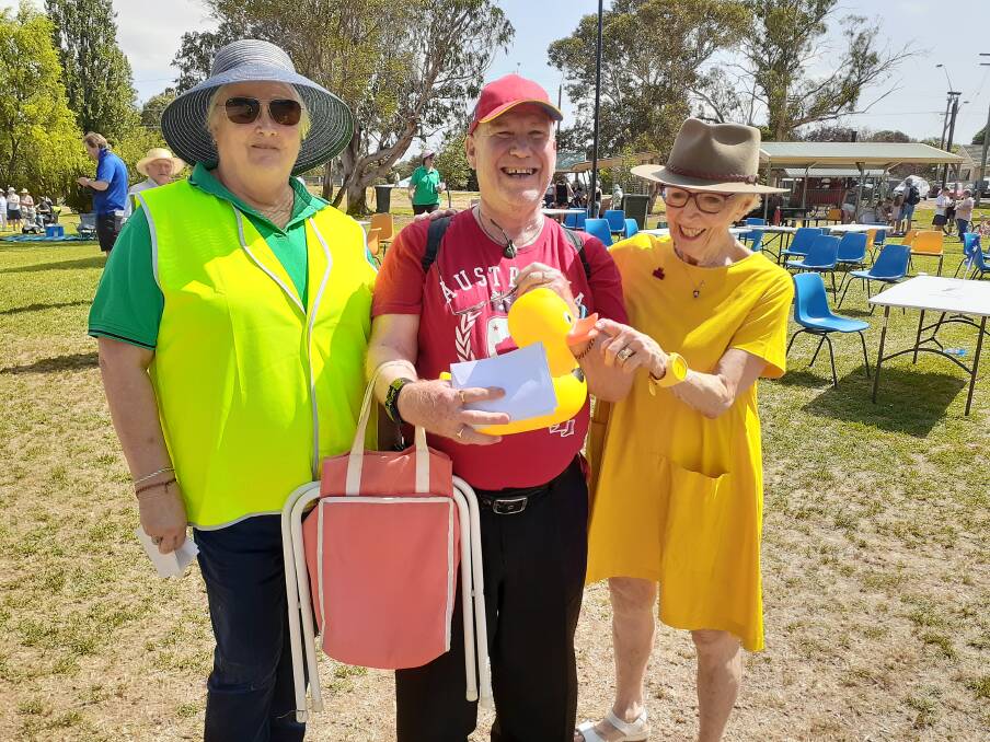 Rotarian Past President Sharon Meere, duck race winner Wayne Harvey and Australia Day Ambassador Robina Beard
