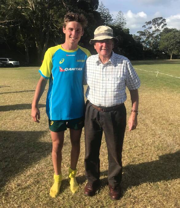 Isaac, pictured with his grandfather Paul Crowe, represented Australia in the World Schools 7s Rugby Tournament in New Zealand. 