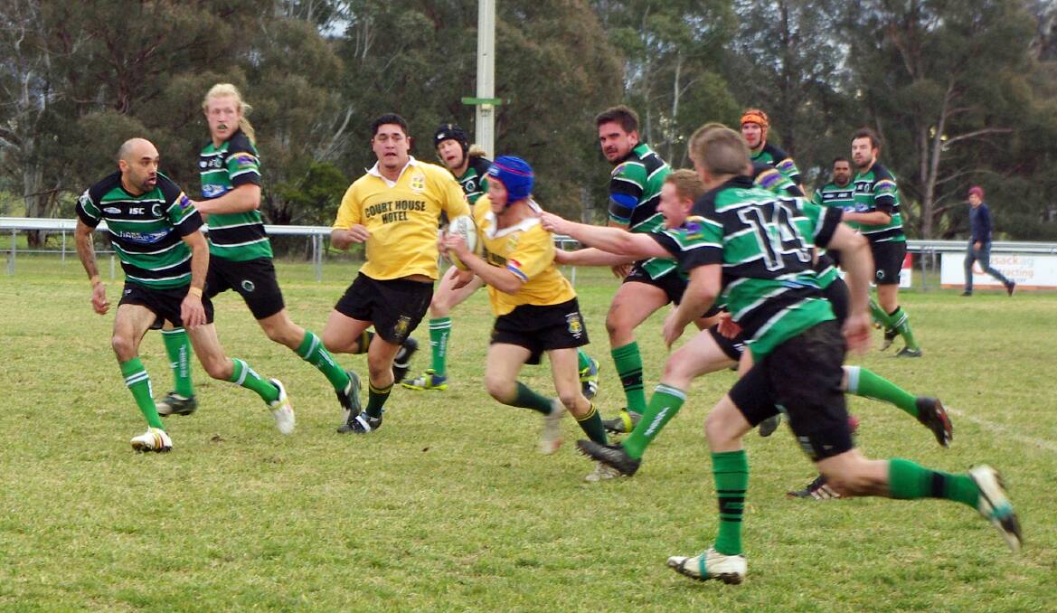 Mark Poplin races through a gap in Jindabyne's defence. He will now play on the Brumbies Provincial Team. File photo. 