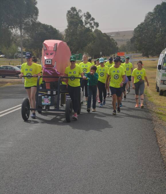 John welcomed Percy the Pig upon his arrival back into Boorowa. More than $45,000 was raised during the Pig Push - well done. Photo by John Snelling. 