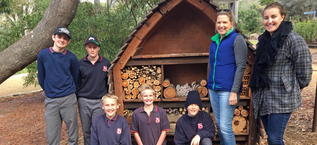 Boorowa Central School students with Landcare co-ordinator Linda Cavanagh and teacher Susan Fagan have been busy saving bees in Canberra. 