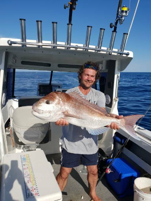 On the water: Encounter Bay fisherman Dave Turner spoke to rescued boatie Tony Higgins on Thursday evening, when he ferried media crews to waters off Granite Island. Photo: Supplied. 