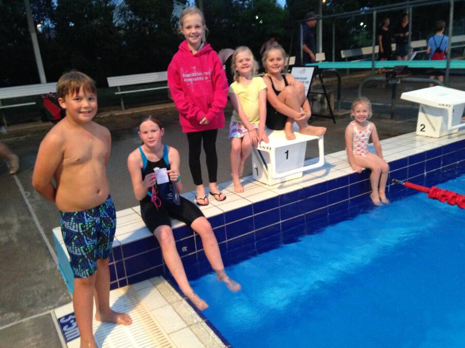 : Boorowa Swimming Club members after a great night at the pool.