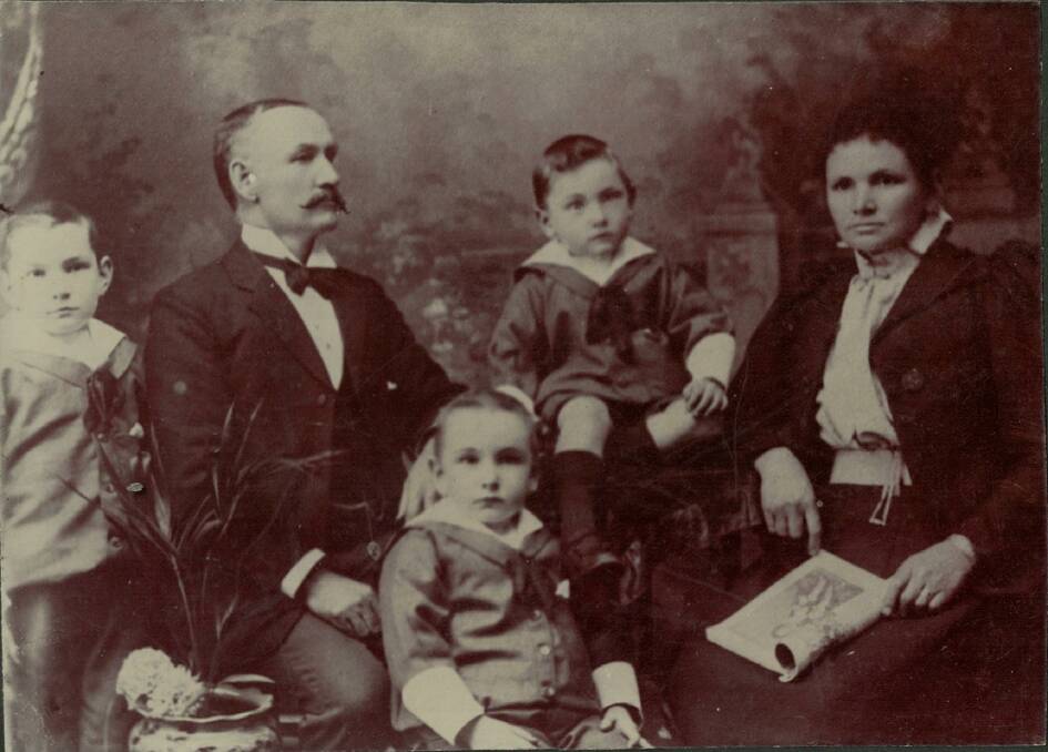 The museum would like the community's help to identify this family.