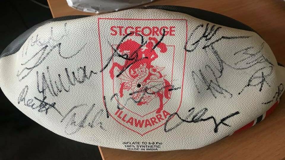 A signed Dragons footy is just one of the prizes on offer on the night. 