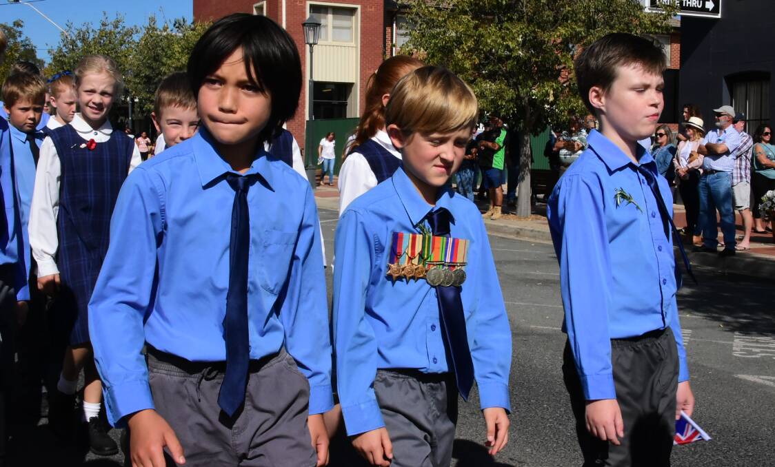 Students from St Joseph's Primary School taking part in the Anzac Day march.