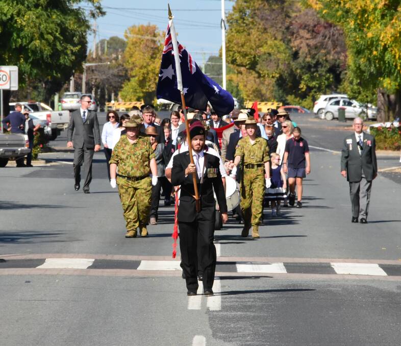 Boorowa residents and returned servicemen marching on Anzac Day.